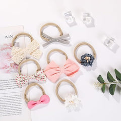 Chiduerm one-size headbands with delicate bows for growing kids