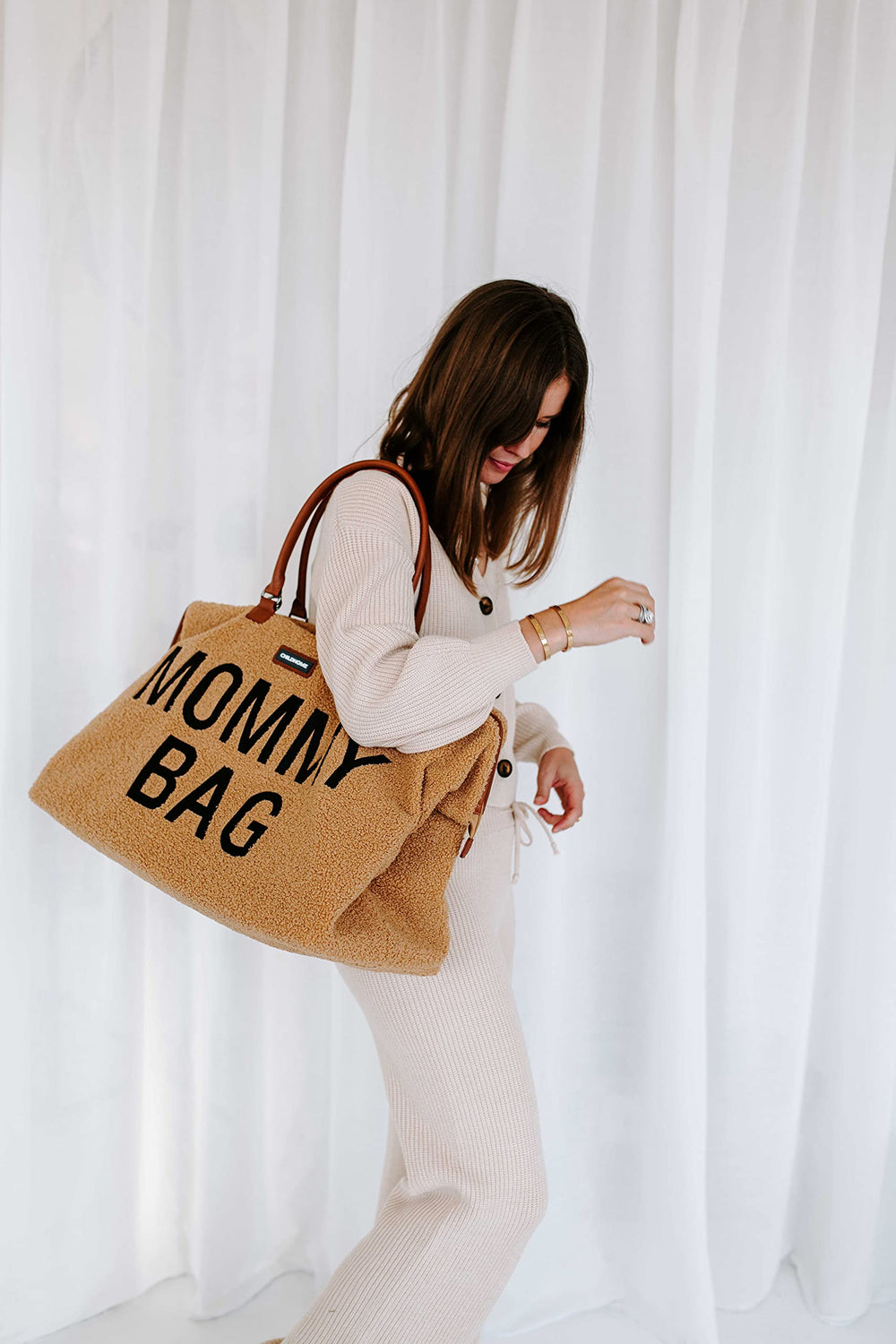 Childhome Mommy Bag Teddy Brown outer pocket for quick-access keys or phone.