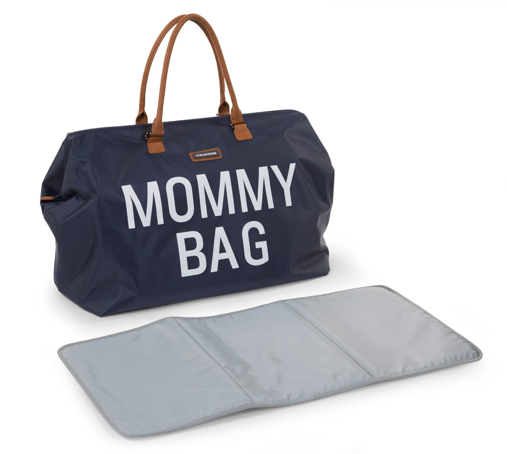 Childhome Navy Large Diaper Bag changing mat included for on-the-go baby care.