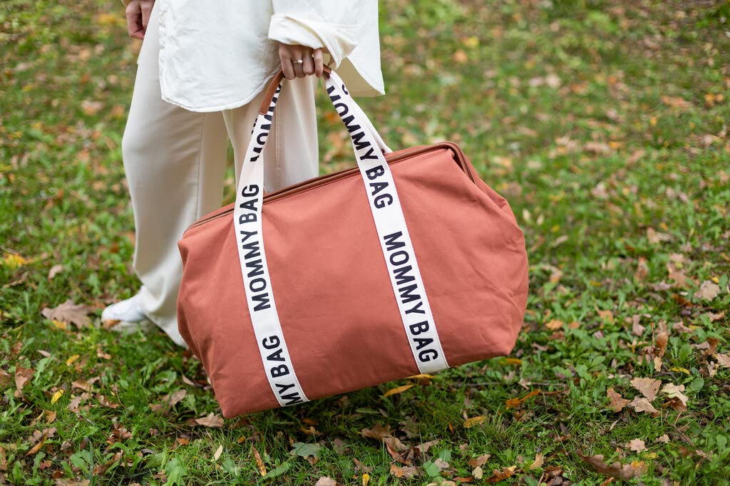 Childhome Signature Mommy Bag 58-litre capacity fits diapers, clothes, and extra gear.