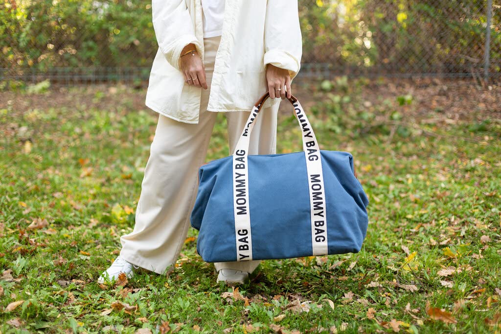 Childhome Signature Mommy Bag Indigo luggage sleeve, easy airport travel with stroller compatibility.