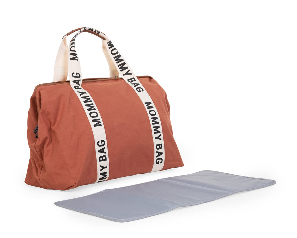 Childhome Signature Mommy Bag luggage sleeve simplifies airport travel with a baby.