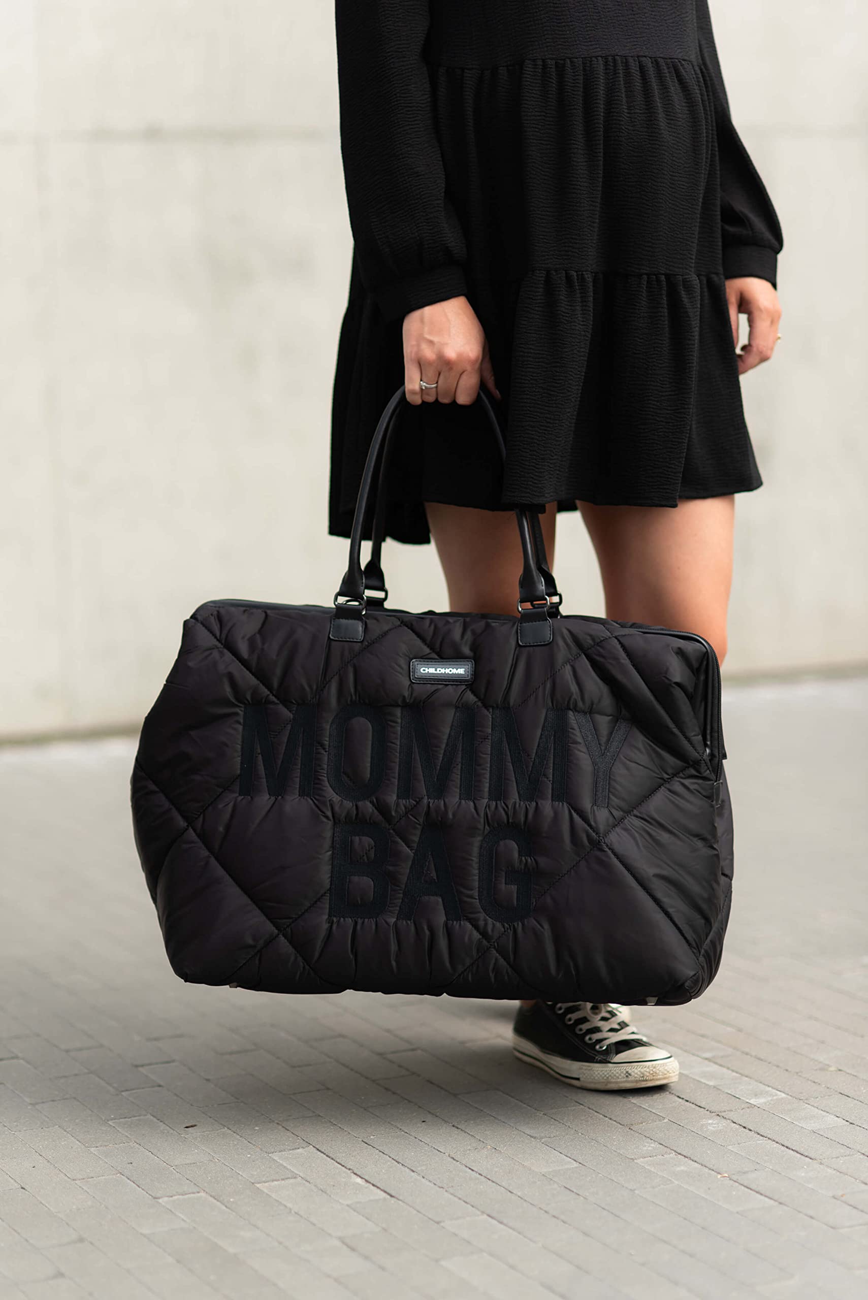 Childhome The Original Mommy Bag included changing mat for on-the-go diaper changes.