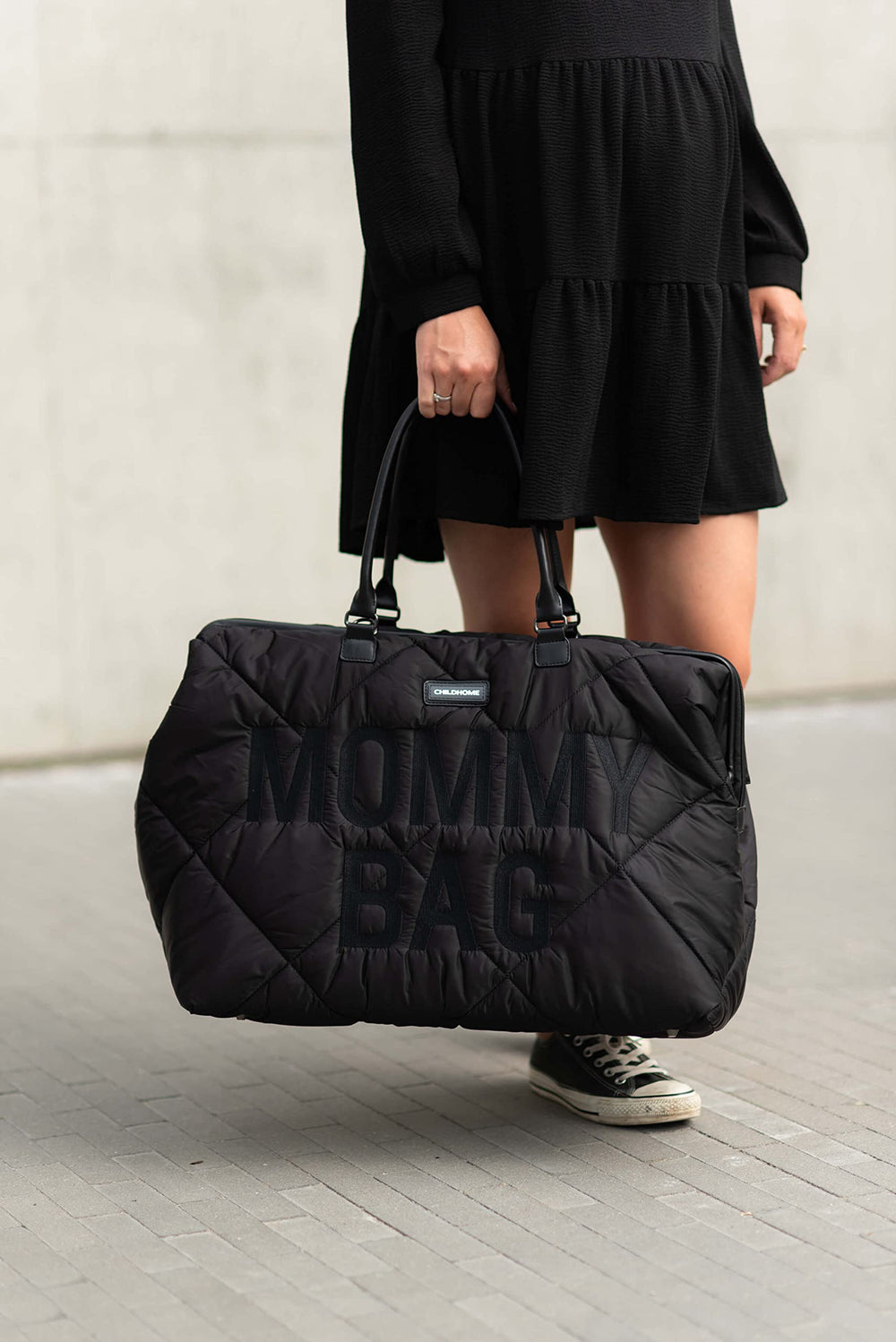 Childhome The Original Mommy Bag included changing mat for on-the-go diaper changes.