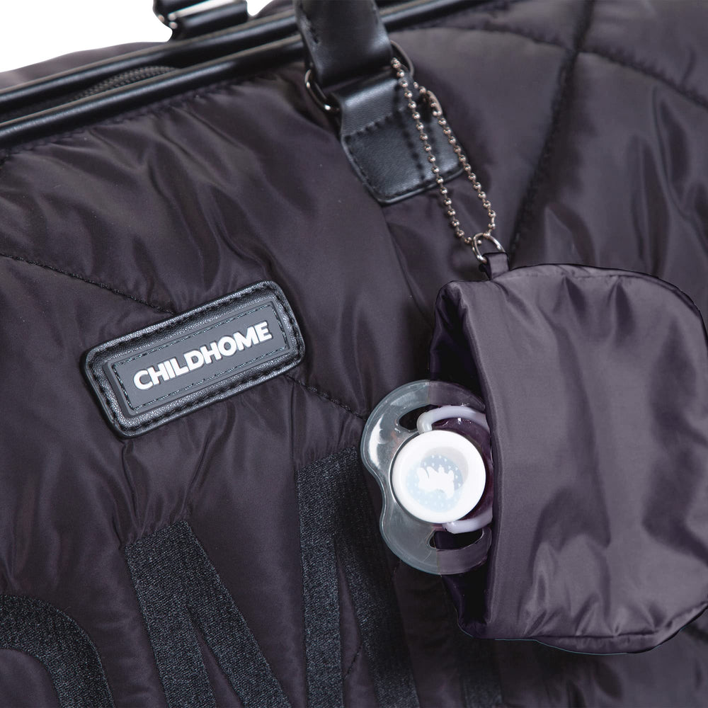 Childhome The Original Mommy Bag luggage sleeve for easy airport travel.