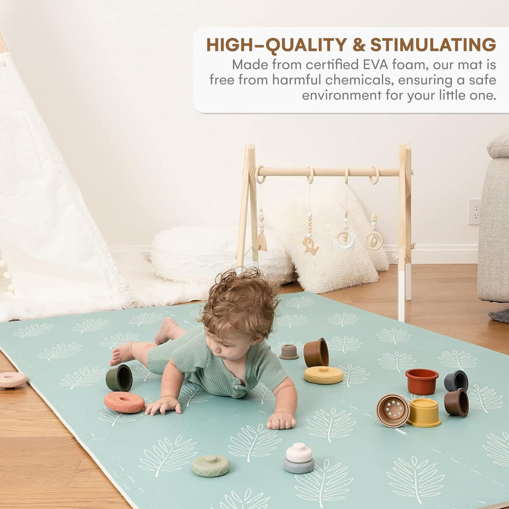 Childlike Behavior leaves 72x48 inch mat shown in a spacious play area, leaves color.