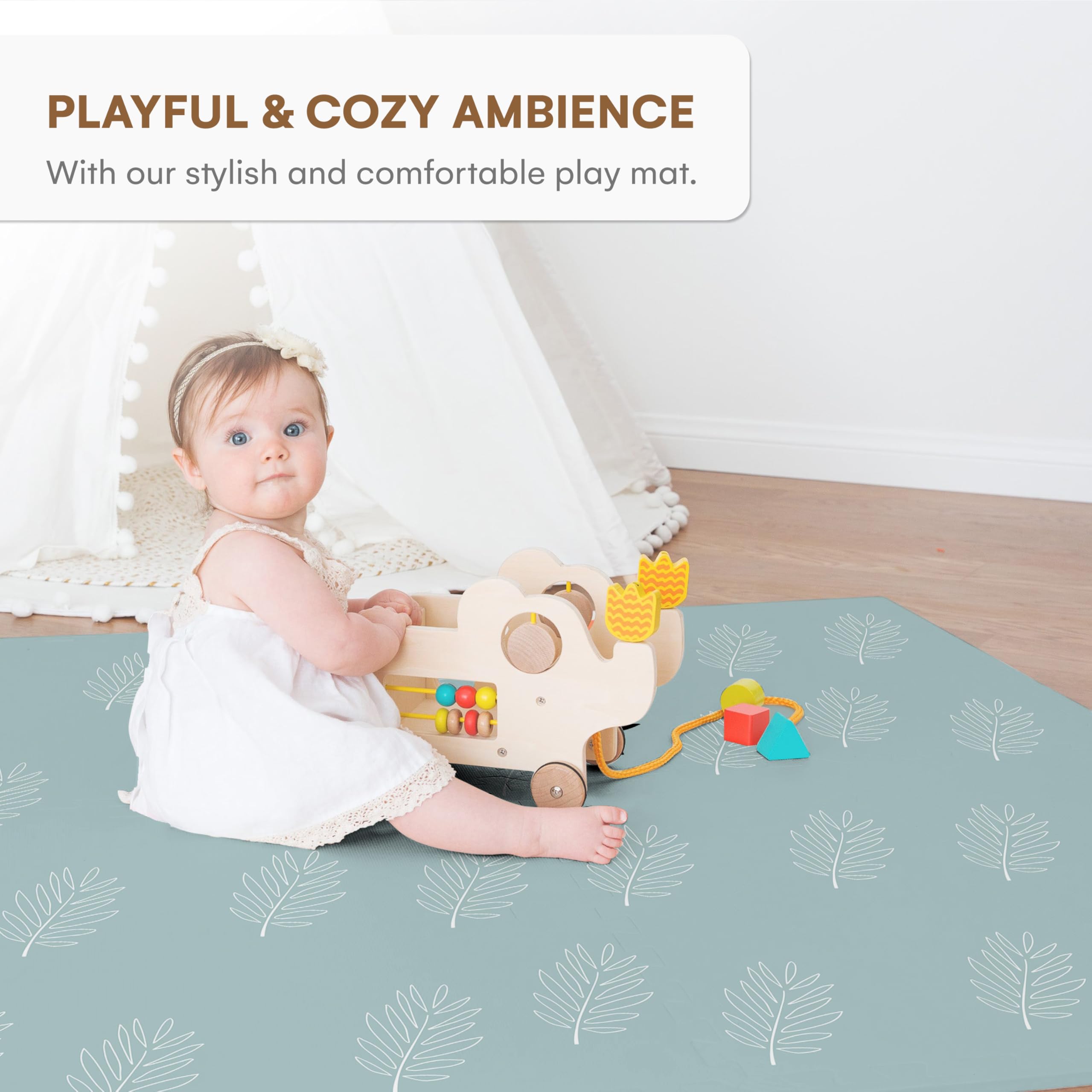 Childlike Behavior leaves interlocking tiles form a secure, safe play space for early explorers.