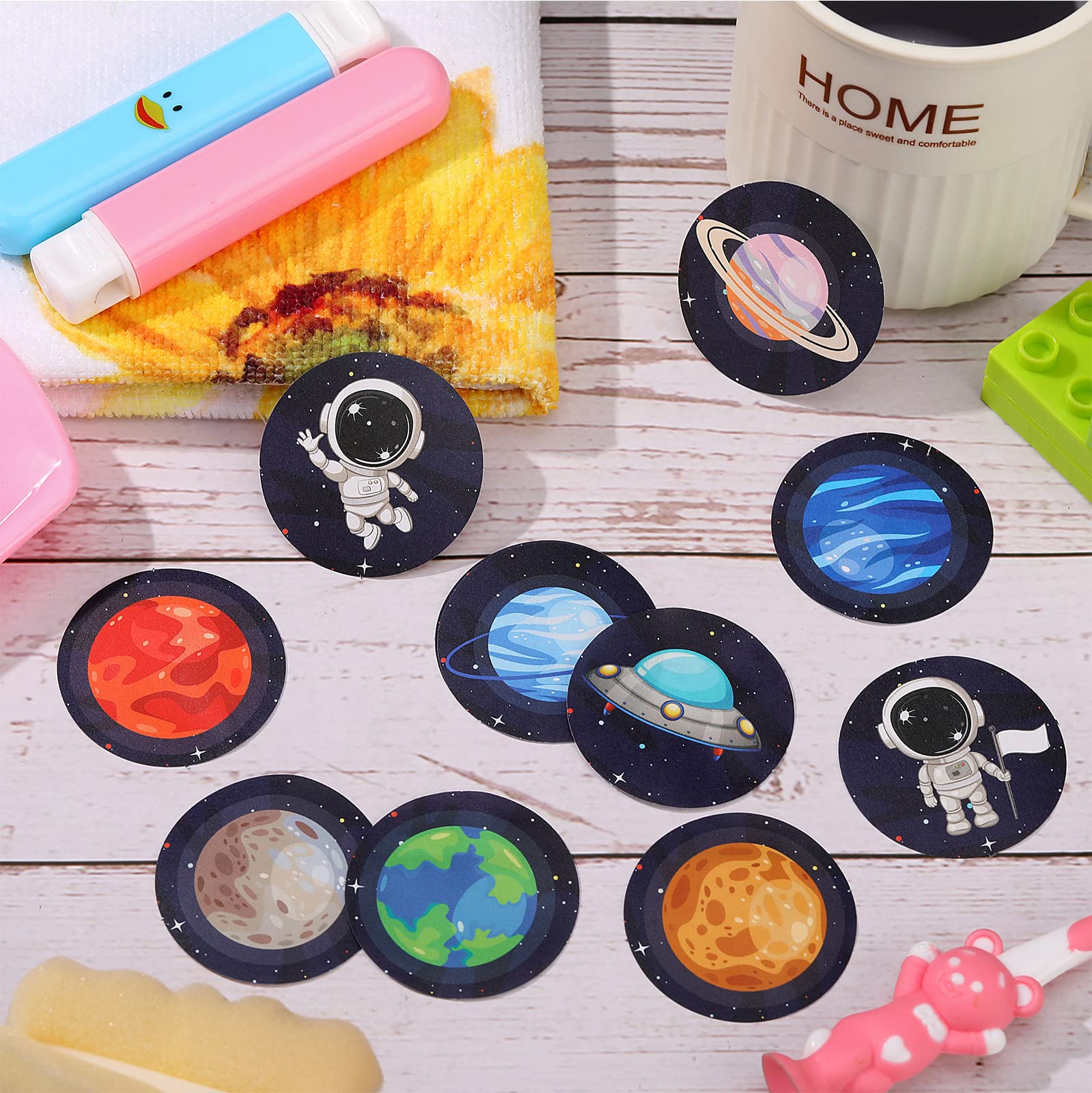 Chinco boys potty-training stickers encourage aiming with space-themed designs.