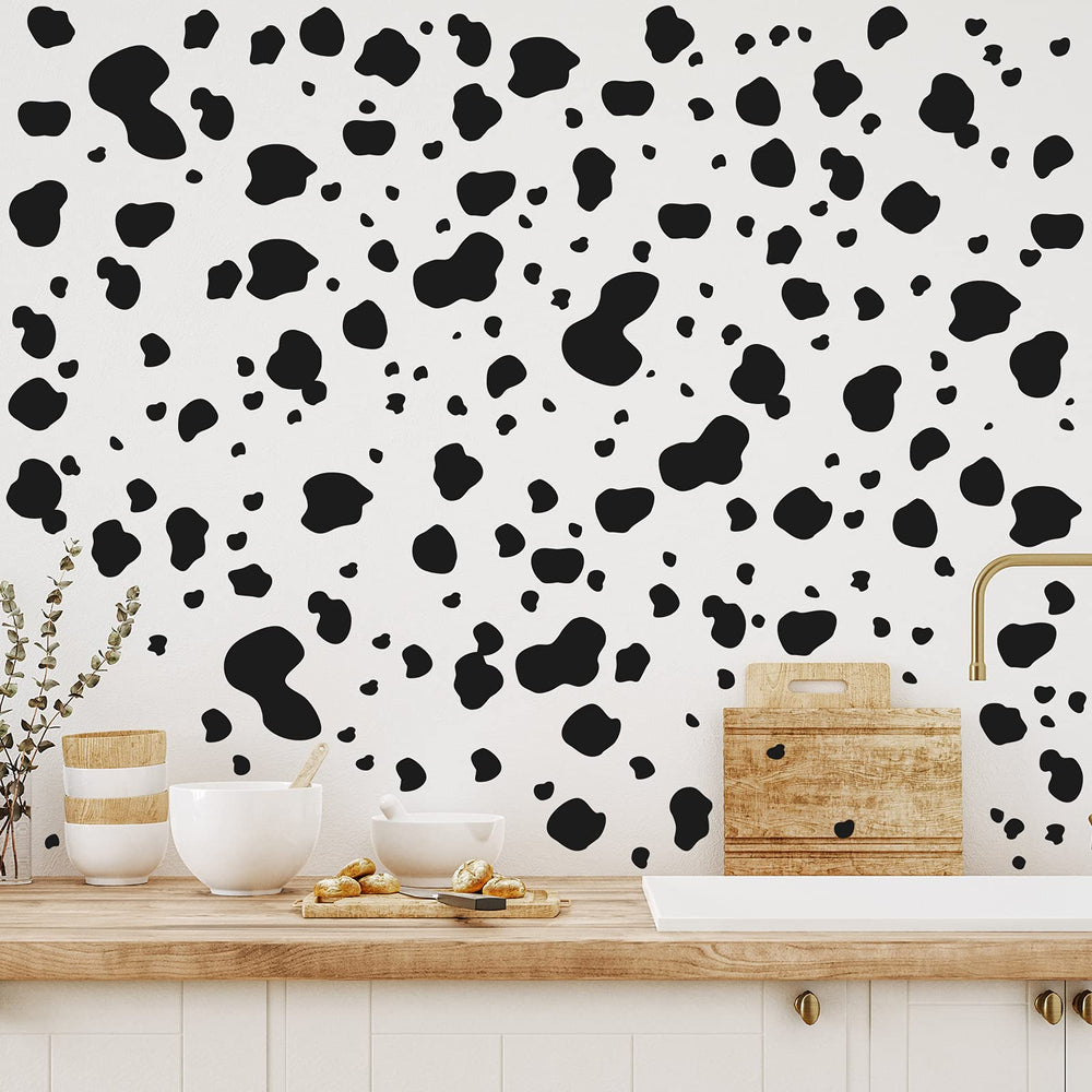 Chinco cow print stickers close-up with glossy finish