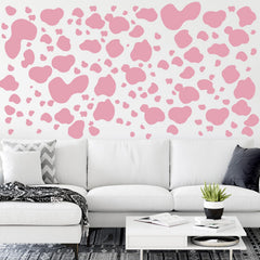 Chinco pink cow-print door application demonstrating peel-and-stick ease