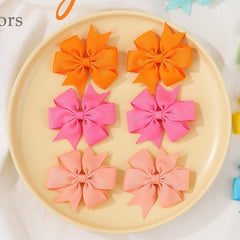 Choicbaby bow clips prevent slipping, keeping bangs away during playtime.