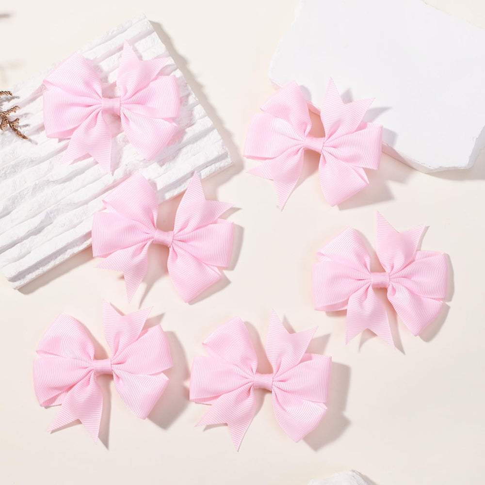 Choicbaby alligator clip securely anchors bows for tidy hairstyles.