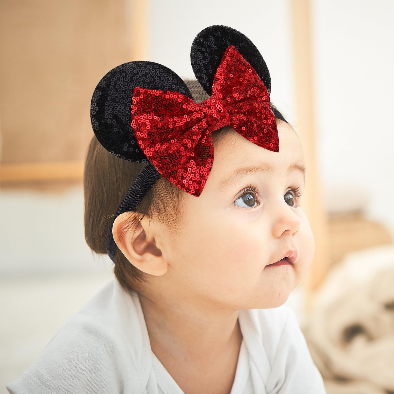 Choicbaby baby headband worn on a tiny head for gentle comfort and style.