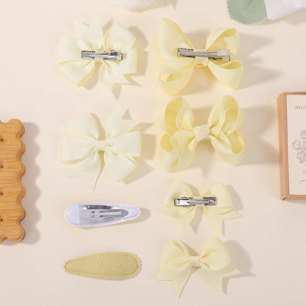 Choicbaby hair styling at a ponytail using yellow bows for daily wear