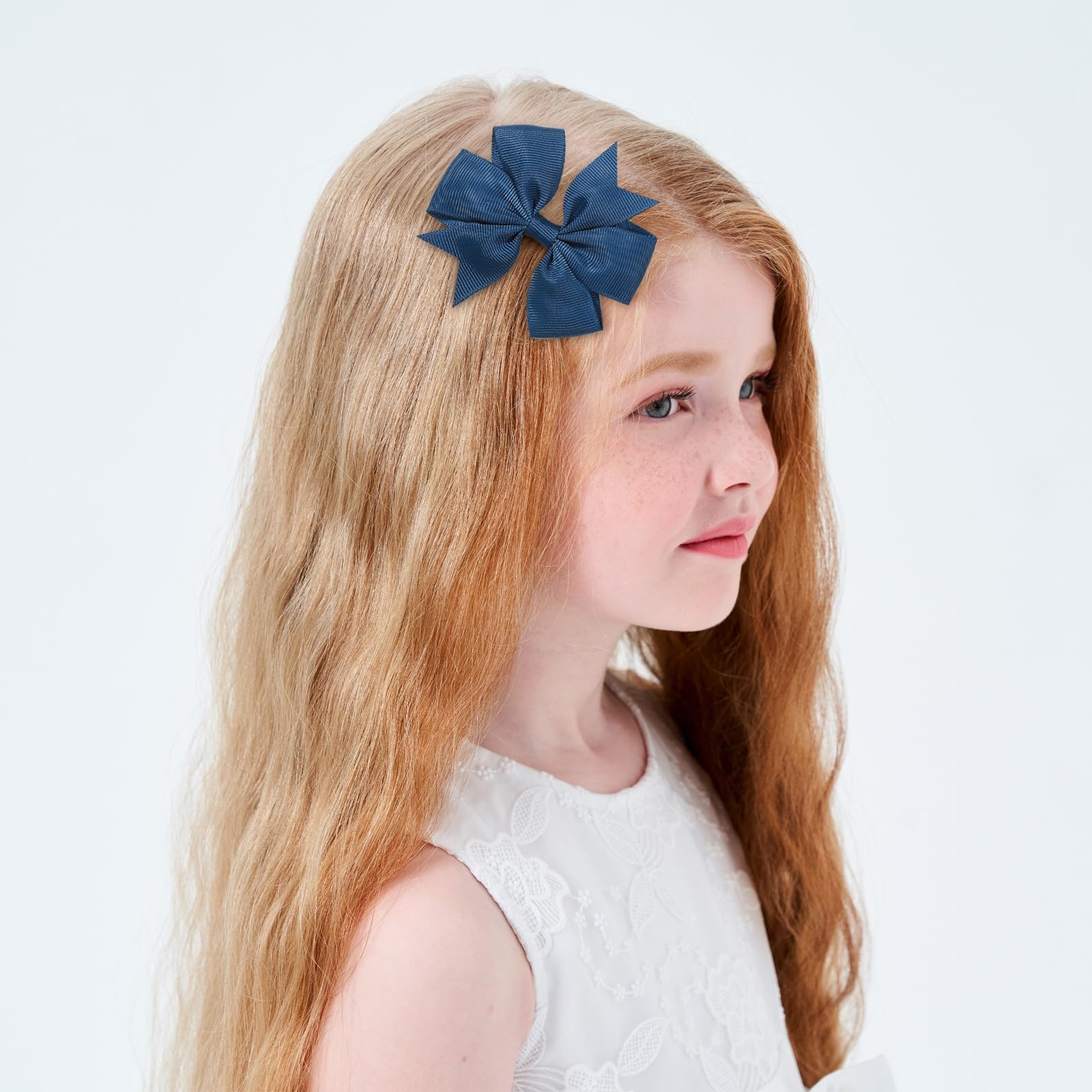 Choicbaby navy bow closeup, showing edge finish and secure glue