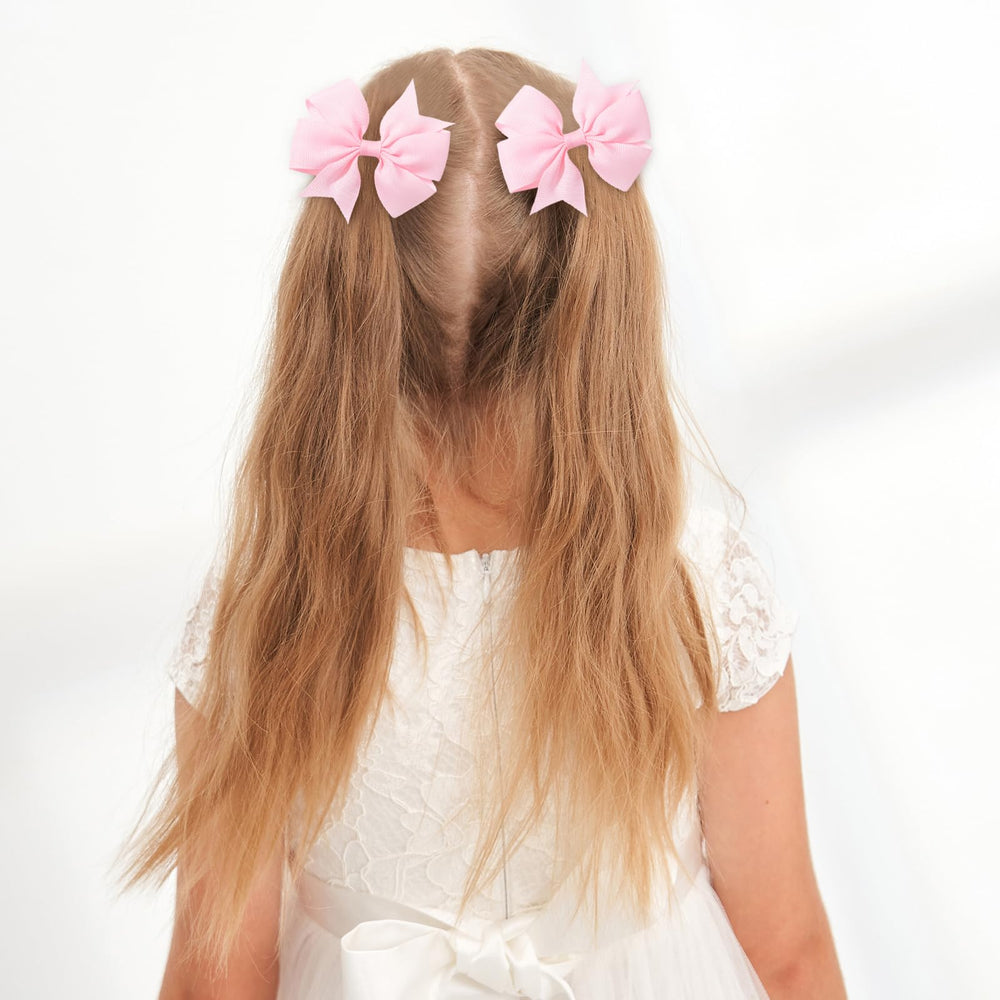 Choicbaby 3-inch pink bow clip for playful pigtails daily wear.