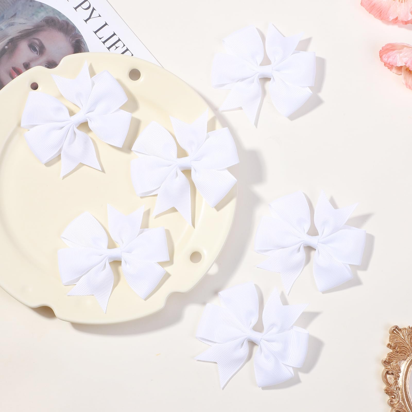 Choicbaby white grosgrain bow closeup showing durable clip and ribbon construction