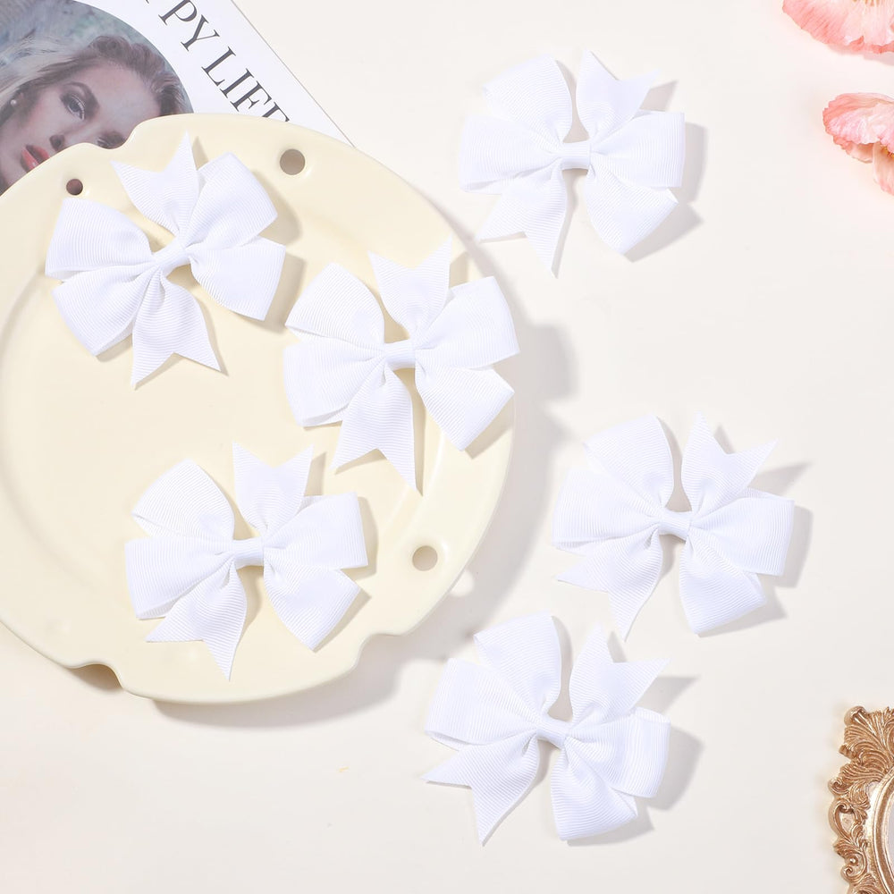 Choicbaby white grosgrain bow closeup showing durable clip and ribbon construction