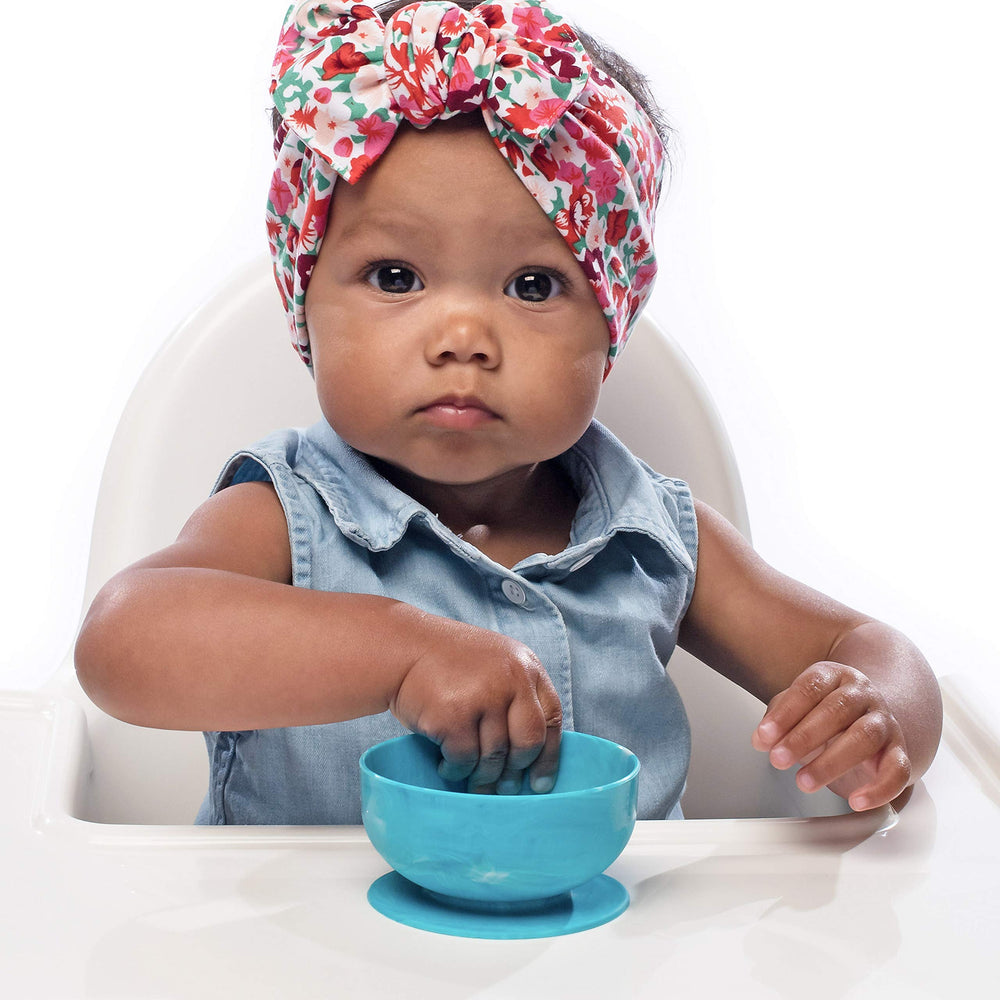 ChooMee four piece set on a high chair tray supports independent eating.