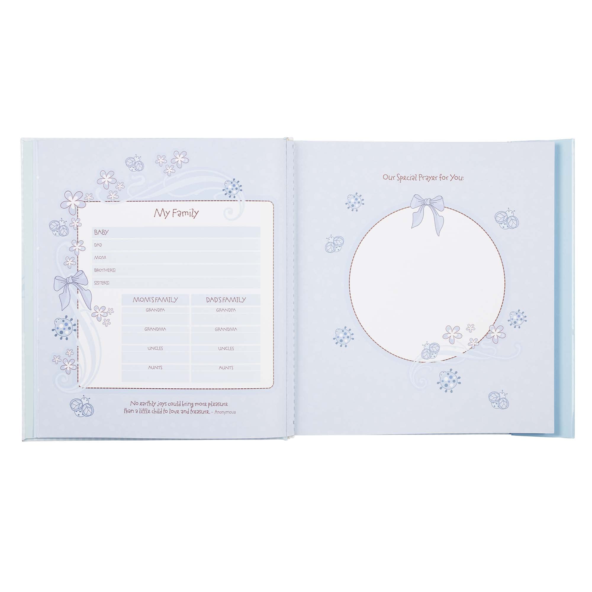 Christian Art Gifts magnetic flap keeps the baby book closed and tidy