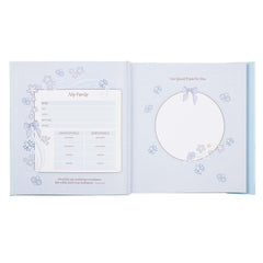 Christian Art Gifts magnetic flap keeps the baby book closed and tidy