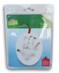 Christmas Crafts plaster handprint ornament red ribbon for easy hanging and gifting.