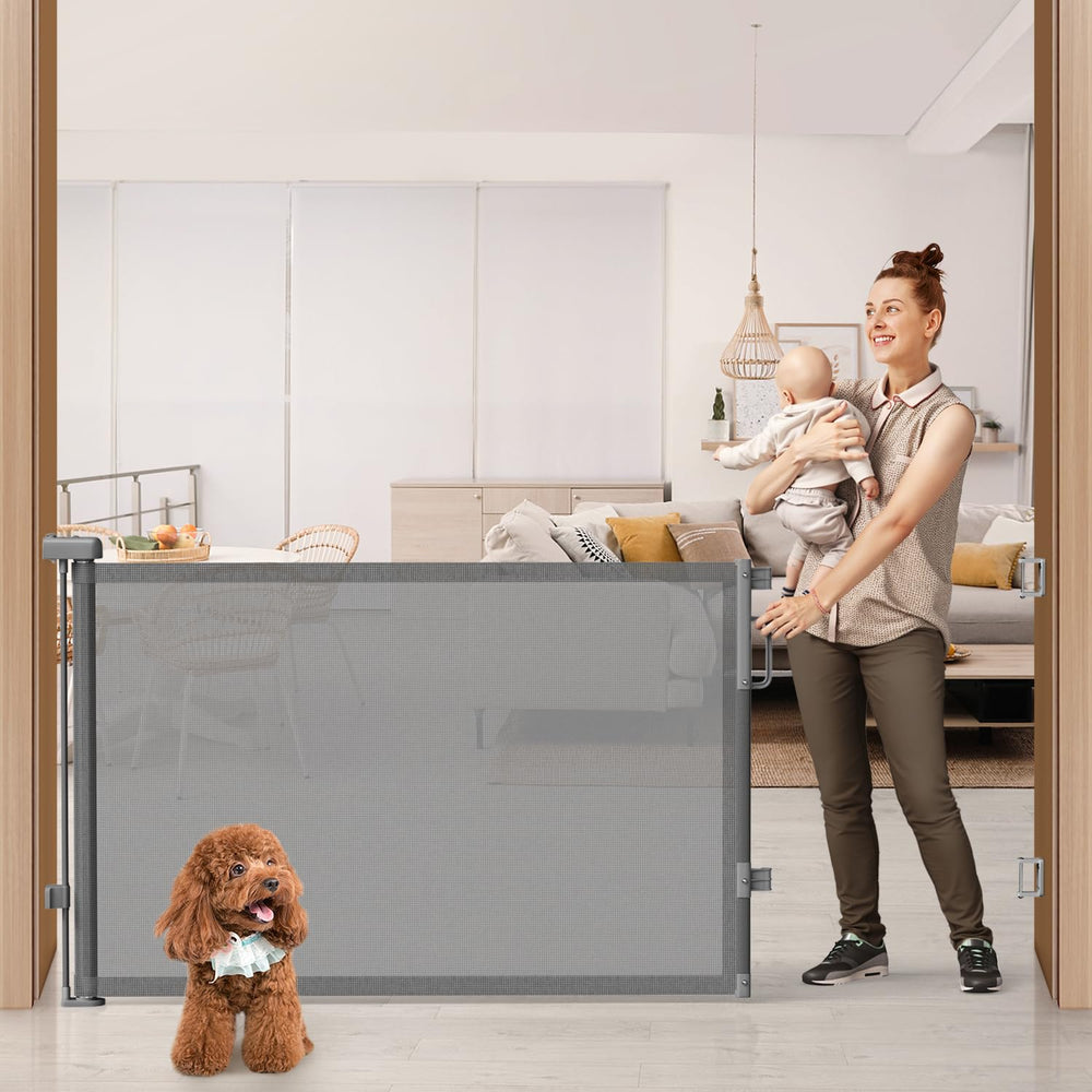 Cideny 76wide retractable gate extended across a doorway for wide openings and safety.