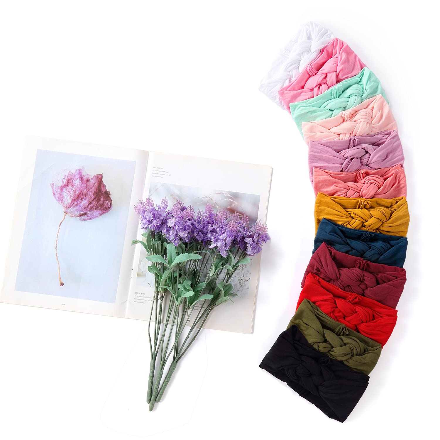 Cinaci teal knotted headband pairs with outfits and stays secure during play.
