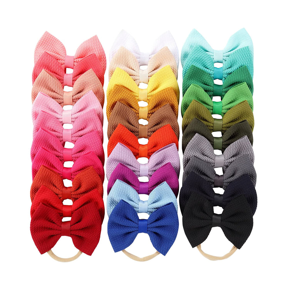 Cinaci bright color baby bows on stretchy nylon headbands offer easy outfit matching.