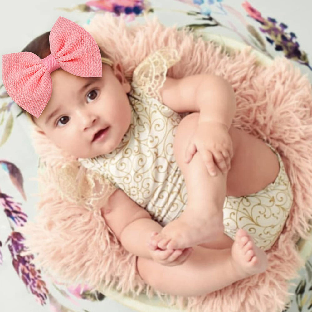 Cinaci delicate grosgrain-wrapped bows add classic charm and durability.