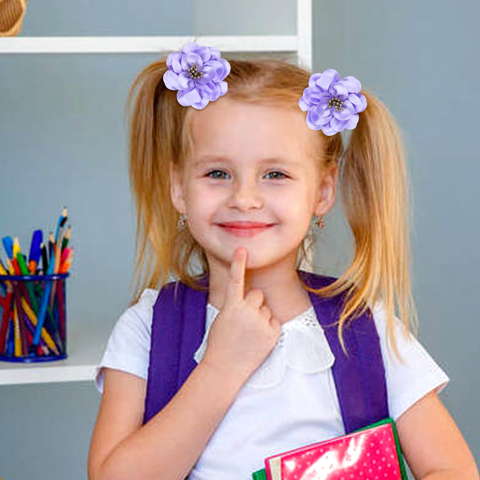 Cinaci elastic band with satin flower detail for secure, comfortable ponytails.