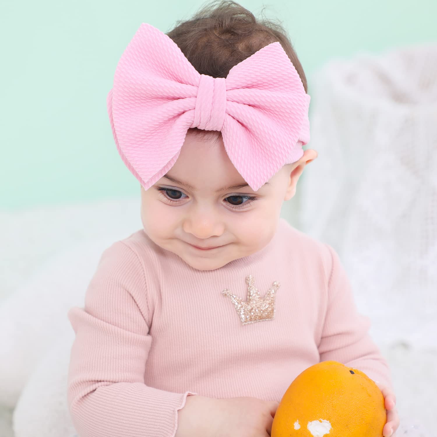 Cinaci headband closeup shows soft material for comfortable all-day wear.
