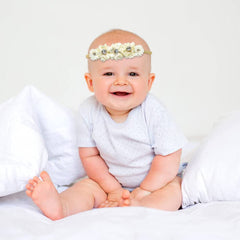 Cinaci headband soft nylon band emphasizes comfort and gentle wear for babies.