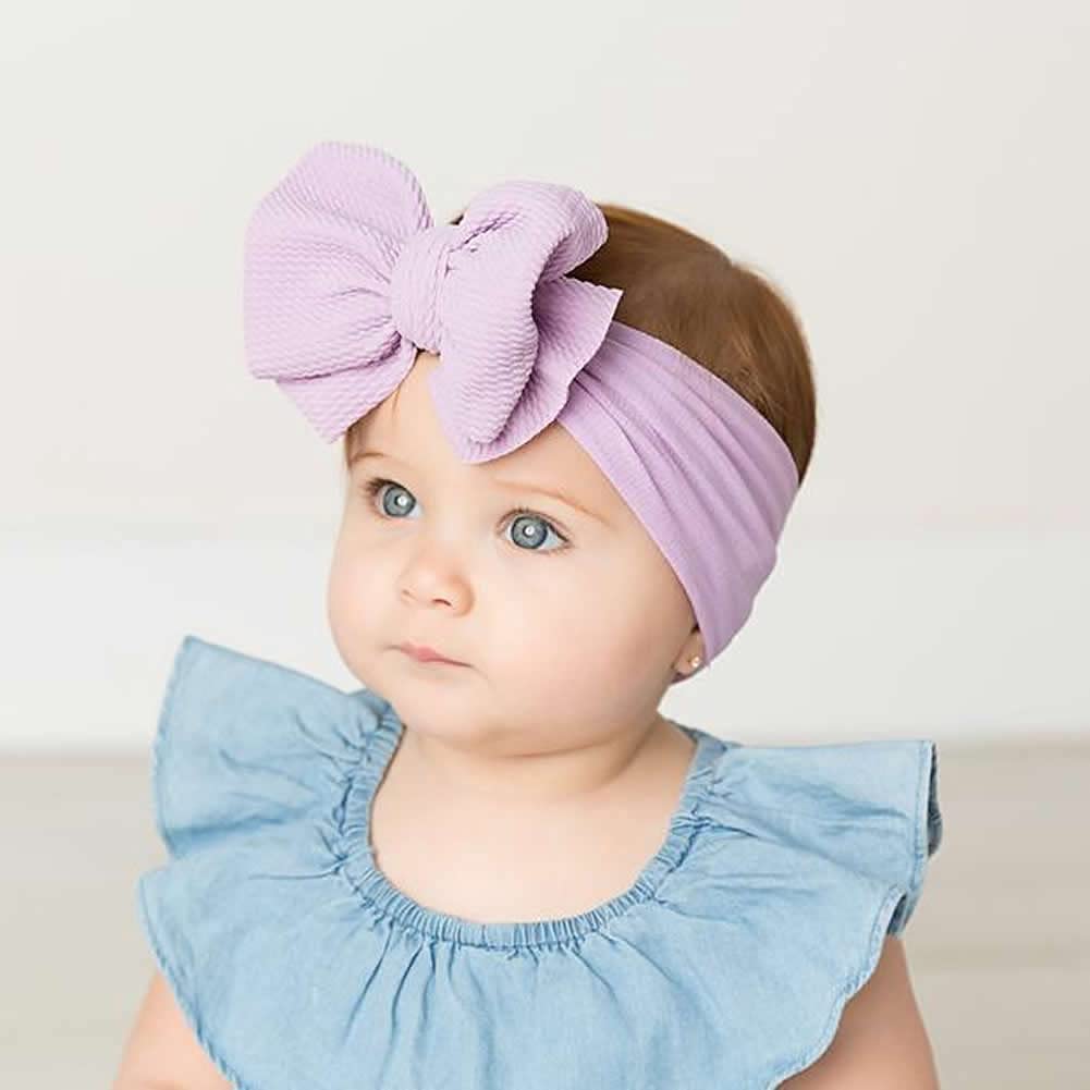 Cinaci newborn headbands ensure a gentle, no-slip fit on tiny heads.
