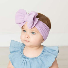 Cinaci newborn headbands ensure a gentle, no-slip fit on tiny heads.