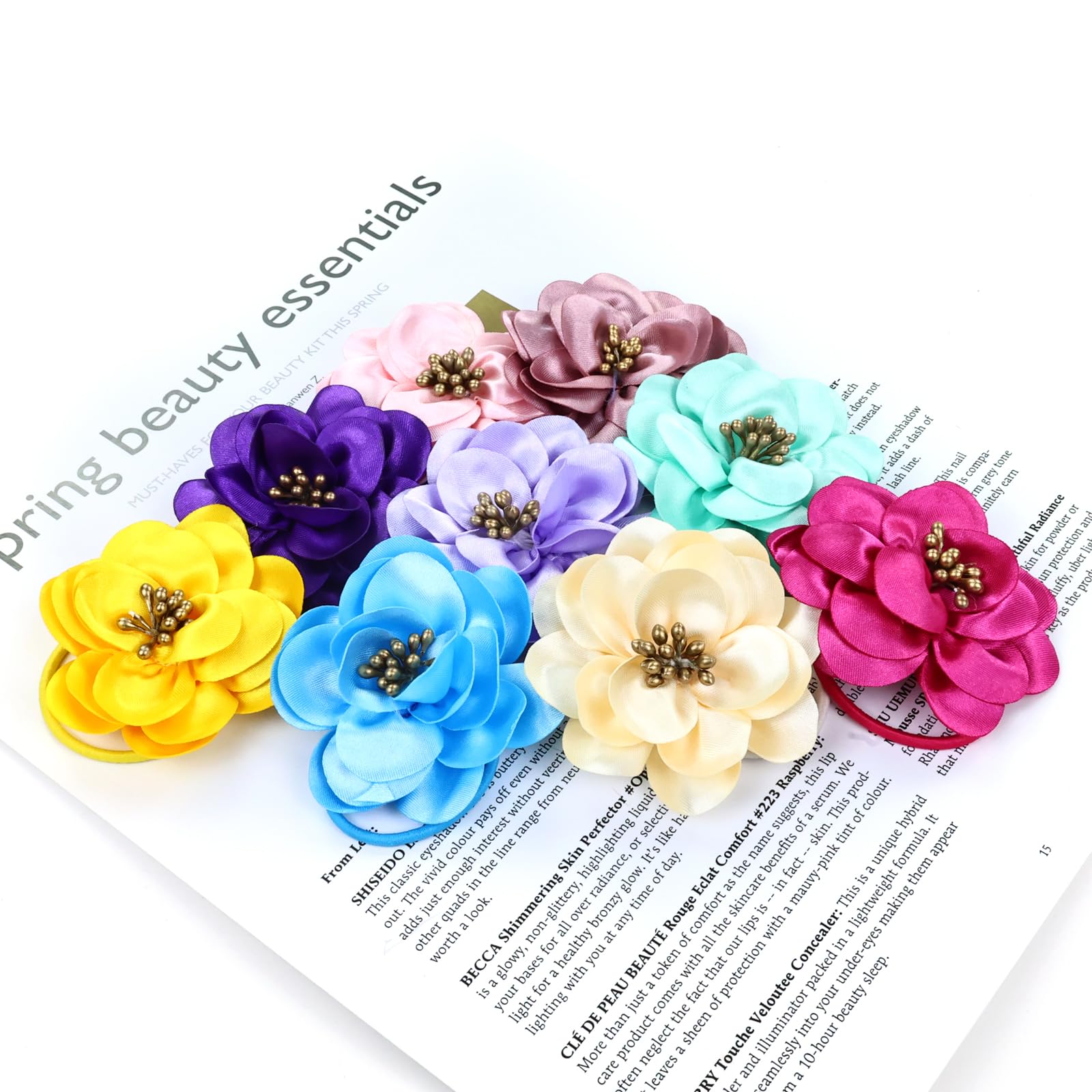 Cinaci satin flower bloom design adds charming accents to any hairstyle.