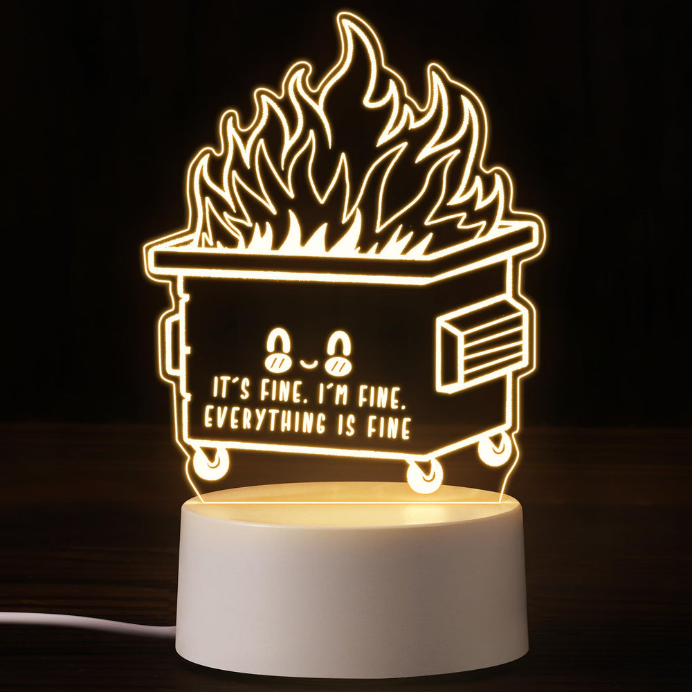 Cinnvoice dumpster fire night light glows warm on a bedside table, creating cozy ambiance.