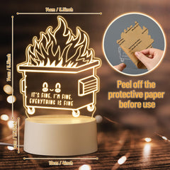 Cinnvoice dumpster fire night light sits on a desk with motivating glow.