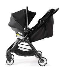 City Tour 2 stroller with adapters demonstrates fast, safe car-seat attachment.