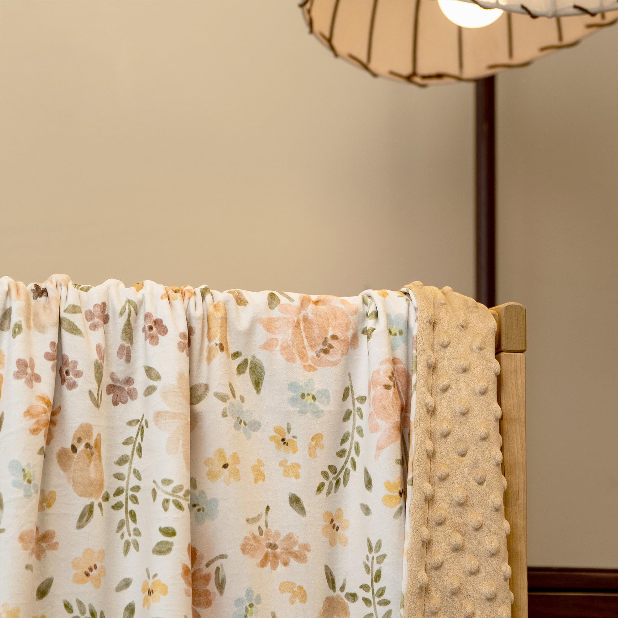 Civarua Kids orange floral design brightens nursery decor.