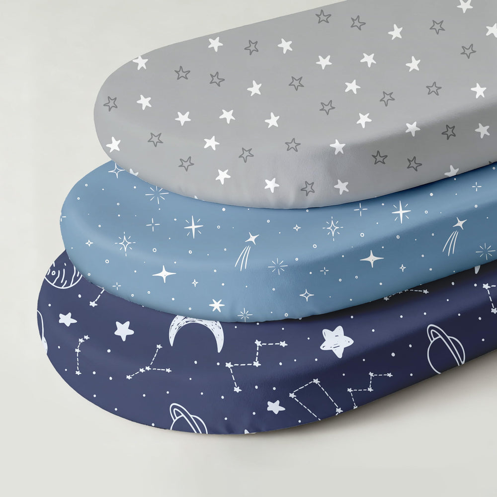 Civarua Kids blue-gray planet bassinet sheets styled on a bassinet