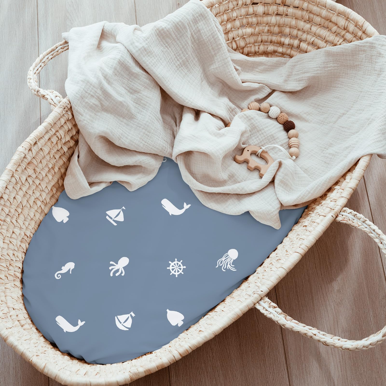 Civarua Kids blue ocean sailor sheets shown on a nursery bassinet for soft comfort.