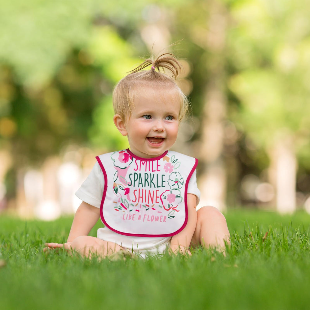 CIVARUA KIDS floral pattern bib adds cheerful style.