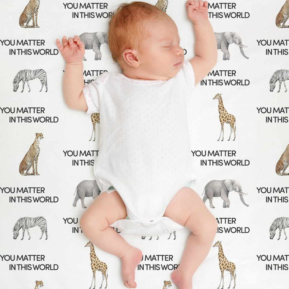 Civarua Kids Minky Leopard blanket 30x40 ready for swaddle and cuddles.
