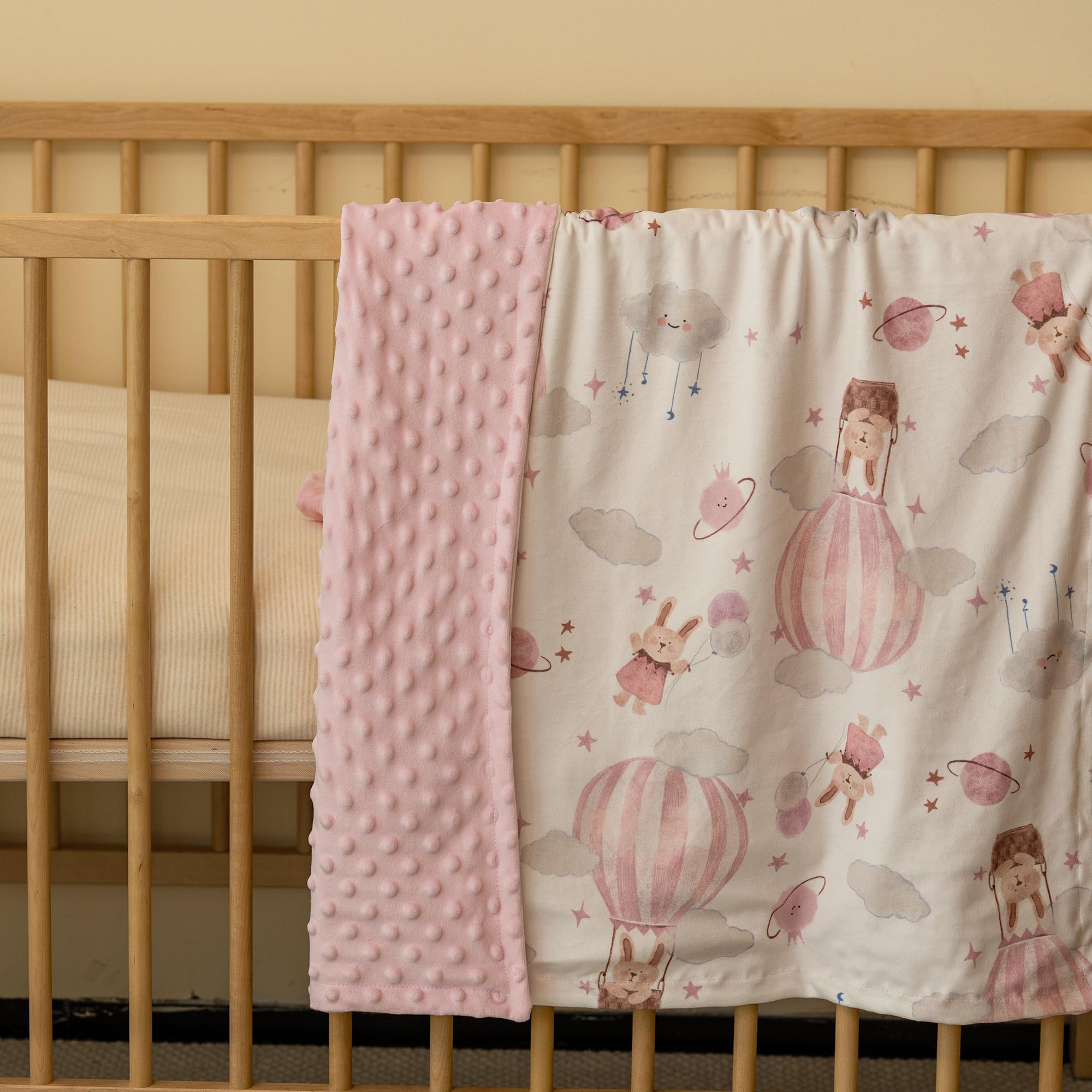 CIVARUA KIDS Minky blanket shown swaddling a sleeping baby for cozy warmth