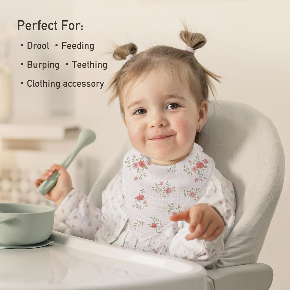 CIVARUA KIDS muslin baby bib adjustable-snaps closeup highlighting adjustable fit for growing babies.