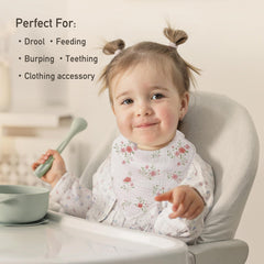 CIVARUA KIDS muslin baby bib adjustable-snaps closeup highlighting adjustable fit for growing babies.