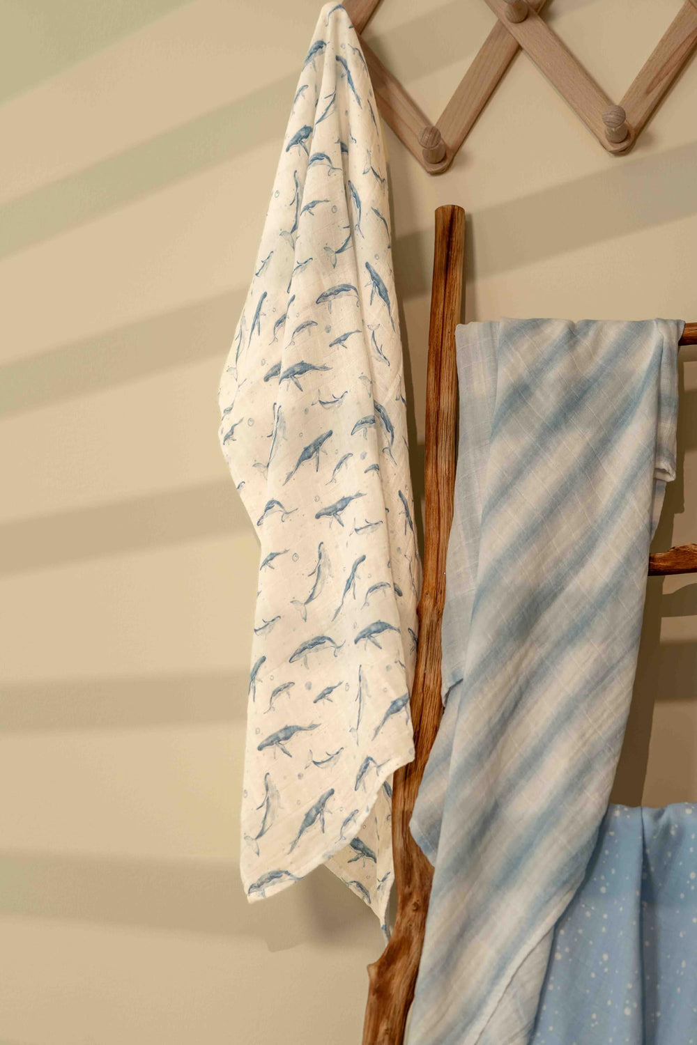 Civarua Kids muslin swaddle blue whale stroller-shield image shows on-the-go protection