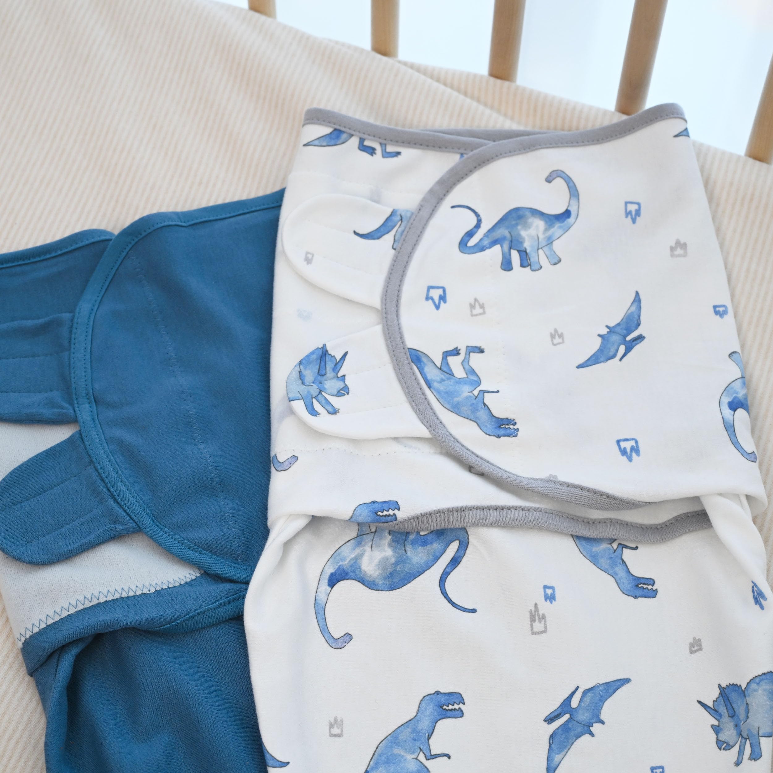 Civarua Kids swaddle blue dinosaur 22x26 inches provides secure wrap and growth-friendly adjustability.