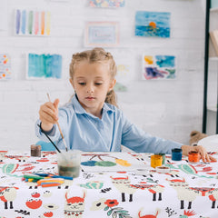 CLCROBD Splat Mat waterproof floor protector catching spills during art time.